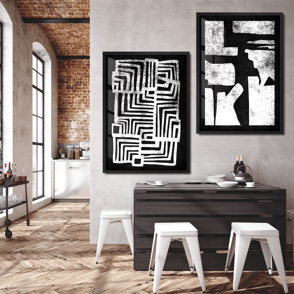 2 quadros decorativos pendurados na parede com tema preto e branco estilo minimalistas