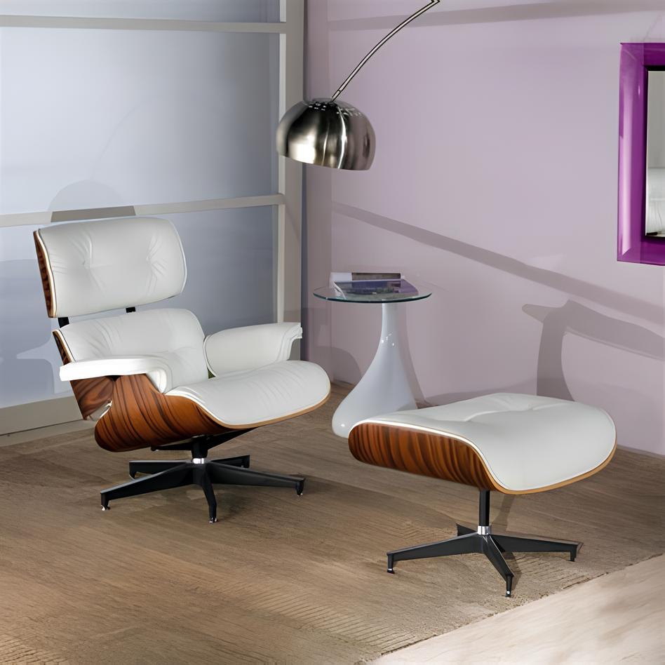 ambiente com uma poltrona charles eames branca de couro com madeira ao lado mesinha moderna de vidro e cerâmica branca com livros em cima, atrás uma luminária de metal grande