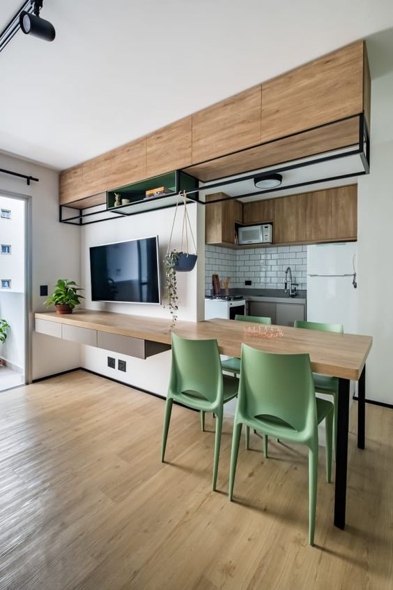 sala de jantar com sala de tv integrada